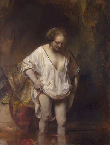 REMBRANDT Harmenszoon van Rijn A woman bathing.